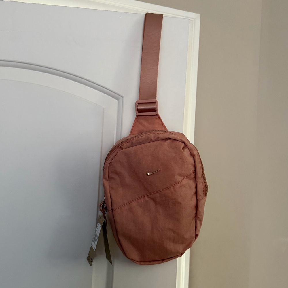 Brand new”NIKE”shoulder bag.Size-W 9”x12”inch.Color-peach.🧡